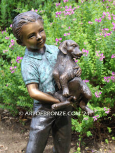 Play with me charming bronze statue of boy playing with puppy dogs