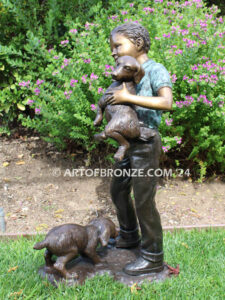 Play with me charming bronze statue of boy playing with puppy dogs