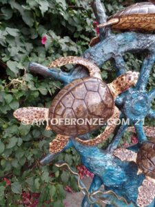 Sunken Treasure bronze ship wheel, coral reef and swimming sea turtles sculpture for home, pool or fountain