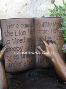 Tales and Dreams bronze statue of young girl reading her favorite novel