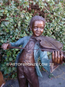 Virtuoso Pals wonderful outdoor bronze sculpture featuring three children playing music concert