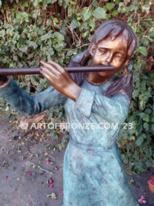 Virtuoso Pals wonderful outdoor bronze sculpture featuring three children playing music concert