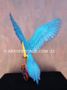 Easy Rider Blue and Gold Macaw riding tricycle bronze statue