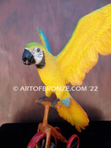 Easy Rider Blue and Gold Macaw riding tricycle bronze statue