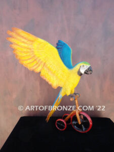 Easy Rider Blue and Gold Macaw riding tricycle bronze statue