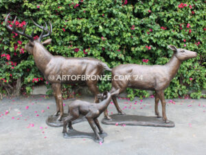 At First light outdoor monumental bronze buck, doe & fawn standing sculptures