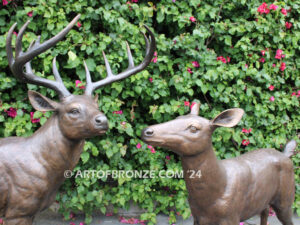 At First light outdoor monumental bronze buck, doe & fawn standing sculptures