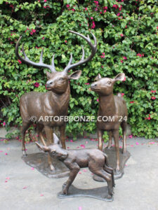 At First light outdoor monumental bronze buck, doe & fawn standing sculptures