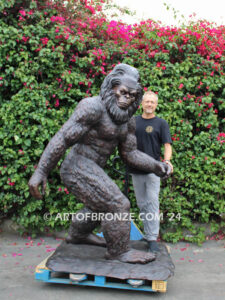 Bigfoot monumental outdoor bronze sculpture of walking mythological creature