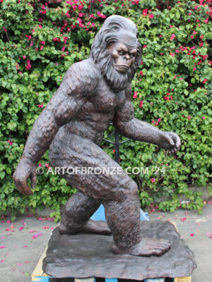 Bigfoot monumental outdoor bronze sculpture of walking mythological creature