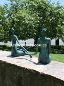 Bond of Us modern bronze sculpture of two sitting figures holding hands