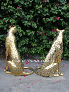 Golden Guardians high quality cast bronze African cheetah bronze sculpture pair sitting next to each other