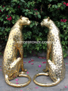 Golden Guardians high quality cast bronze African cheetah bronze sculpture pair sitting next to each other