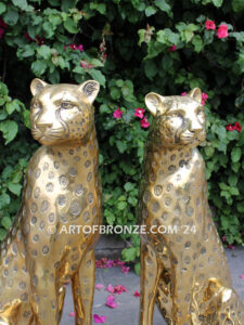 Golden Guardians high quality cast bronze African cheetah bronze sculpture pair sitting next to each other