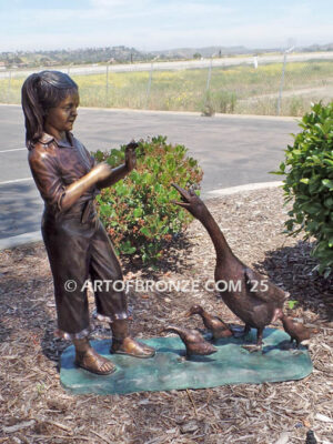 Protecting Mother bronze sculpture of young girl crossing path