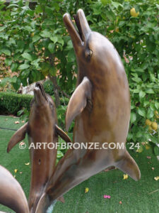 Rising Symphony fine art gallery bronze statue of four leaping dolphins in fountain