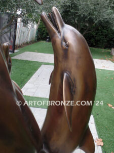 Rising Symphony fine art gallery bronze statue of four leaping dolphins in fountain