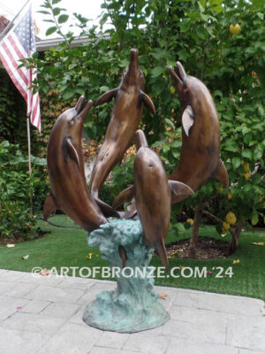 Rising Symphony fine art gallery bronze statue of four leaping dolphins in fountain