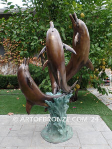 Rising Symphony fine art gallery bronze statue of four leaping dolphins in fountain