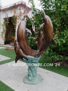 Rising Symphony fine art gallery bronze statue of four leaping dolphins in fountain